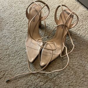 Clear and nude pointed toe heel